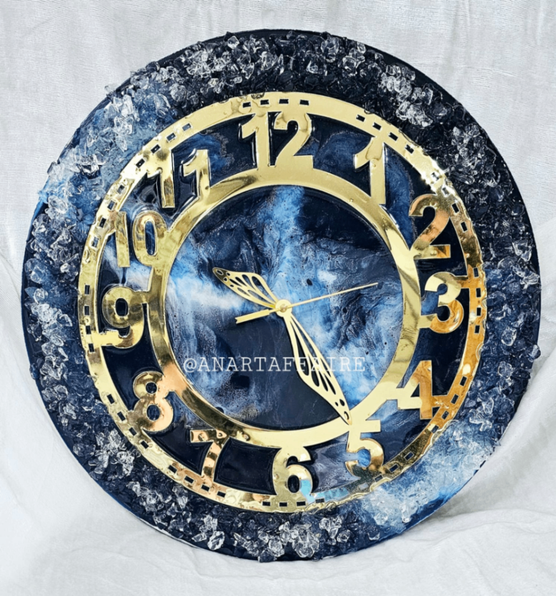 Blue resin clock with crystal edge and gold number ring