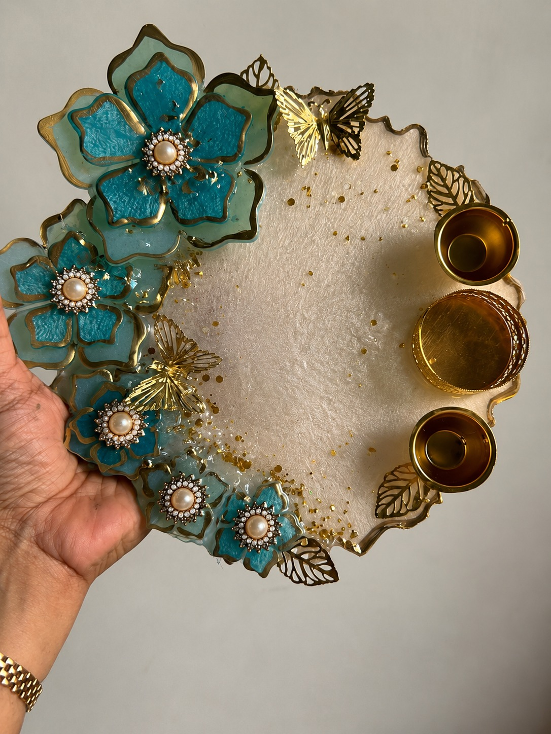 Elegant resin serving tray with blue flowers, butterflies, and gold accents